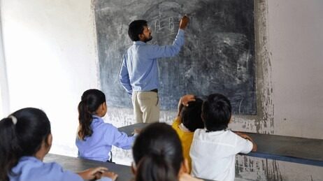 indian-teacher-teaching-rural-sc